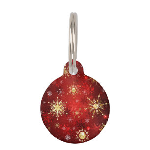 Placa Para Mascotas Copos de nieve dorados de Navidad sobre fondo rojo