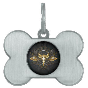 Placa Para Mascotas Cráneo de pájaro dorado sobre fondo negro