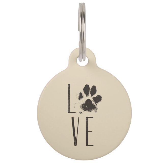 Placa Para Mascotas Dibujo con una imagen de la pata que expulsa el am (Anverso)