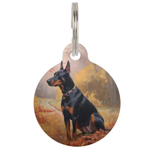 Placa Para Mascotas Doberman en otoño inspira caída de hojas