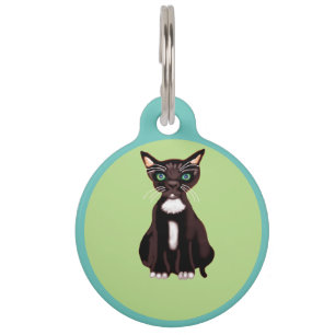 Placa Para Mascotas Gatito negro y blanco sobre fondo verde
