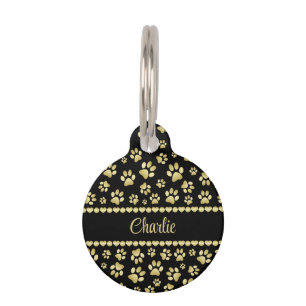 Placa Para Mascotas Huellas de pezuña doradas en negro con nombre pers