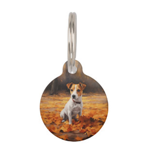 Placa Para Mascotas Jack Russell entre hojas de otoño que caen Inspira