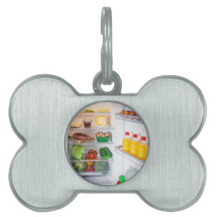 Placa Para Mascotas Nevera abierta llena de comida