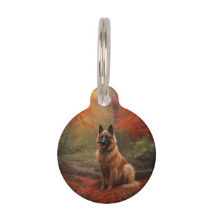 Placa Para Mascotas Pastor Belga entre Hojas de Otoño que Caen Inspira