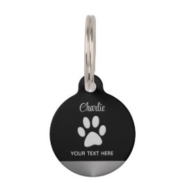 Placa Para Mascotas Paw de perro plateado sobre fondo negro