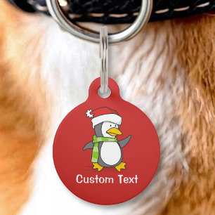 Placa Para Mascotas pingüino de Navidad caminando sobre la nieve