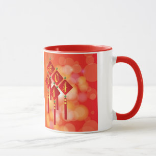Placas chinas del Año Nuevo con la taza de la