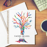 Planificador de arcoiris personalizado<br><div class="desc">Este Planner único y colorido está decorado con un diseño original del árbol de la vida. Personalizable con tu nombre y año. Utilice la opción Personalizar adicional para cambiar el tamaño, estilo o color del texto si lo desea. Porque creamos nuestra propia obra de arte no encontrarás esta imagen exacta...</div>