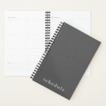 Planificador de "programación" gris profesional<br><div class="desc">El planificador profesional de negocios presenta un diseño mínimo en una paleta de colores grises con acentos blancos. texto personalizado presentado en el cuadrante inferior, centrado en un tipo de letra simple y elegante. Mostrado con "agenda" al frente en la tipografía moderna, este planificador de negocios personalizado está diseñado con...</div>