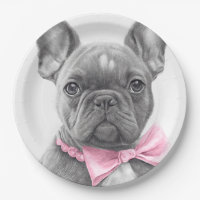 Adorable cachorro de bulldog francés con arco rosa