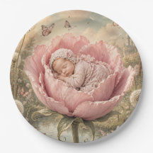 Bebé durmiendo en flor rosa