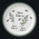 Plato De Papel Bee Merry Christmas Evergreen Holiday Party Plate<br><div class="desc">No te pierdas la oportunidad de asistir a la reunión de tu apicultor local con estos adorables platos. El mensaje "BEE MERRY" se repite en un plato pesado de papel blanco con verduras de vacaciones y abejas melíferas realistas. O - puedes hornear un pastel de miel saludable o galletas de...</div>