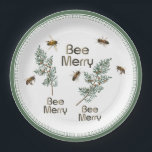 Plato De Papel Bee Merry Christmas Evergreen Holiday Party Plate<br><div class="desc">No te pierdas la oportunidad de asistir a la reunión de tu apicultor local con estos adorables platos. El mensaje "BEE MERRY" se repite en un plato pesado de papel blanco con verduras de vacaciones y abejas melíferas realistas. O - puedes hornear un pastel de miel saludable o galletas de...</div>