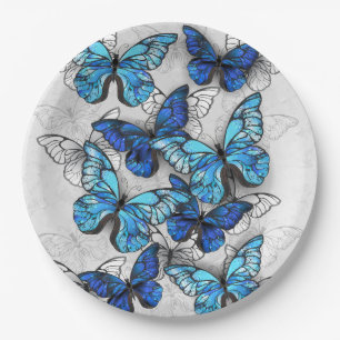 Plato De Papel Composición de las mariposas blancas y azules