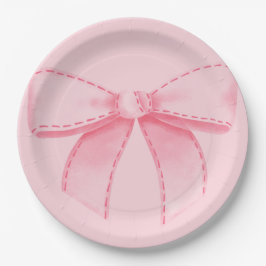 Plato de papel con lazo rosa con fondo rosa liso