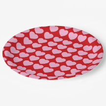Corazones de San Valentín rosados sobre rojo
