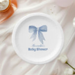 Plato De Papel Cuidada Cinta Azul Bow Bebé Niño Ducha<br><div class="desc">Sirva las delicias con estilo con estas Cute Blue Bow Ribbon Baby Shower Paper Plates! Diseñados para adaptarse a la temática clásica de la ducha de un niño, estos atractivos platos presentan un adorable diseño de cinta azul en un suave fondo pastel. Perfecto para añadir un toque dulce y sofisticado...</div>
