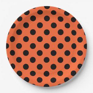 Plato De Papel El polka negro se pone sobre el naranja