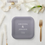 Plato De Papel Elegant Lavender Minimalist<br><div class="desc">This elegant wedding plate features a minimalist design with a gradient lavender and lilac color palette, creating a soft and sophisticated atmosphere. The centered composition highlights the names "Amanda & Jordan" in clean, sans-serif typography, accompanied by smaller serif fonts for location and date details, ensuring clarity and focus. The absence...</div>