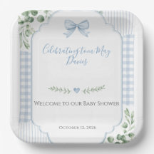 Fiesta de Baby Shower con lazo azul y cuadros de g