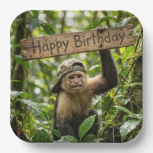 Plato De Papel Mono sosteniendo un cartel de Feliz Cumpleaños