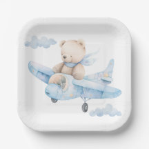 Oso de peluche en placa de papel azul