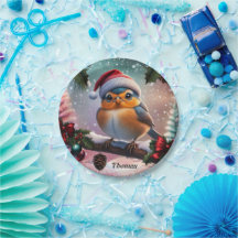 Un pájaro navideño lindo sentado en una rama