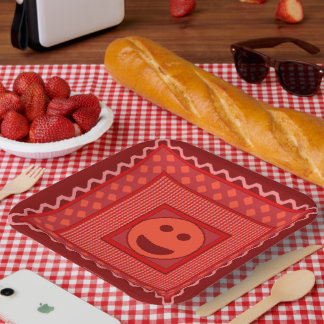 Platos de fiesta de baldosas sonrientes en rojo