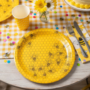 Platos de papel de abeja mielera amarilla y panal