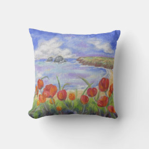 Playa con la almohada cuadrada de las amapolas