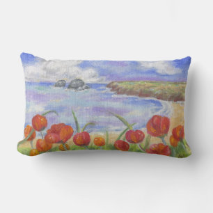 Playa con la almohada grande de las amapolas