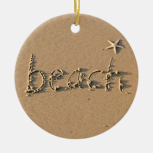 Playa de Sandy y ornamento del navidad de las