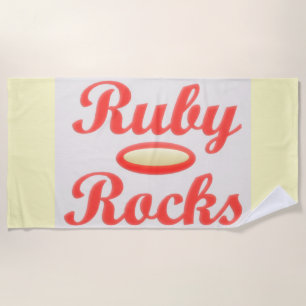 Playa RUBY ROCKS ROJO Y toalla de CREMA