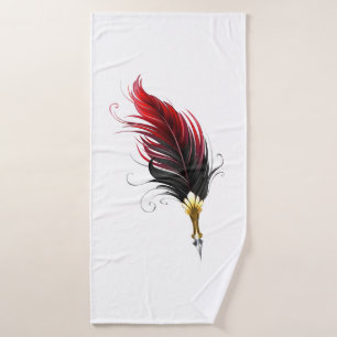 Pluma de plumas rojas con nido de oro