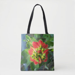 Poinsettia salvaje en una bolsa de tocador impresa