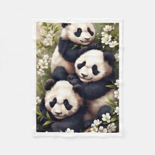 Polar Familia de pandas en manta florida