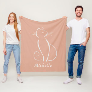 Polar Gato blanco minimalista en manta de felpa rosa con