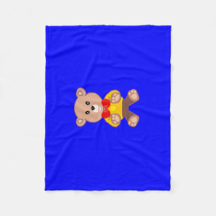 Polar Oso de peluche sobre la manta de la fleta azul