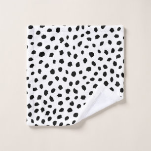 Polkadots al azar negro sobre blanco
