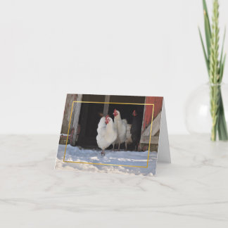 Pollos en la tarjeta de Navidad de la nieve