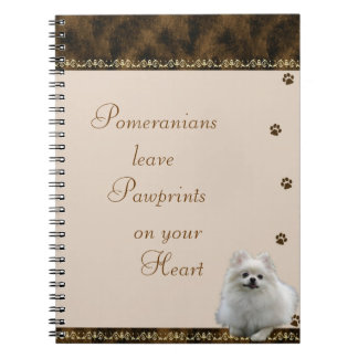 Pomeranian Pawrints en su ~brown del cuaderno del