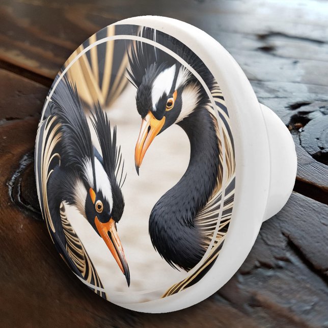 Pomo De Cerámica Cranes románticos decorativos elegantes (An elegant ceramic door knob featuring an illustration of two romantic cranes in deco style)