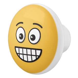 Pomo De Cerámica Grinning Face con los ojos abiertos