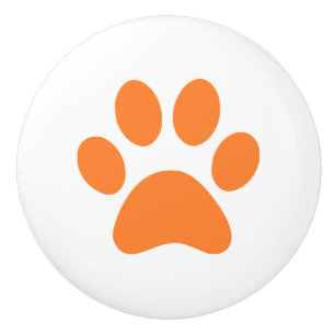 Pomo De Cerámica Pawprint anaranjado de la impresión de la pata