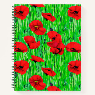 Poppies rojos en un diario de campo verde