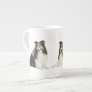 Porcelana Mezcla de Sheltie y taza del partido