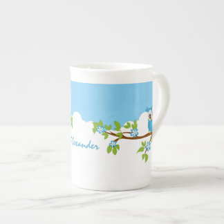 Porcelana Muchacho lindo del búho en una taza de la
