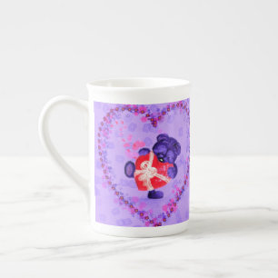 Porcelana Oso bebé con taza de regalo de corazón