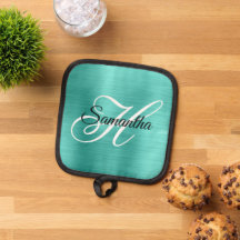 Monograma de Relieve metalizado de color turquesa